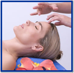 Image of a Woman receiving a Massage to the Head